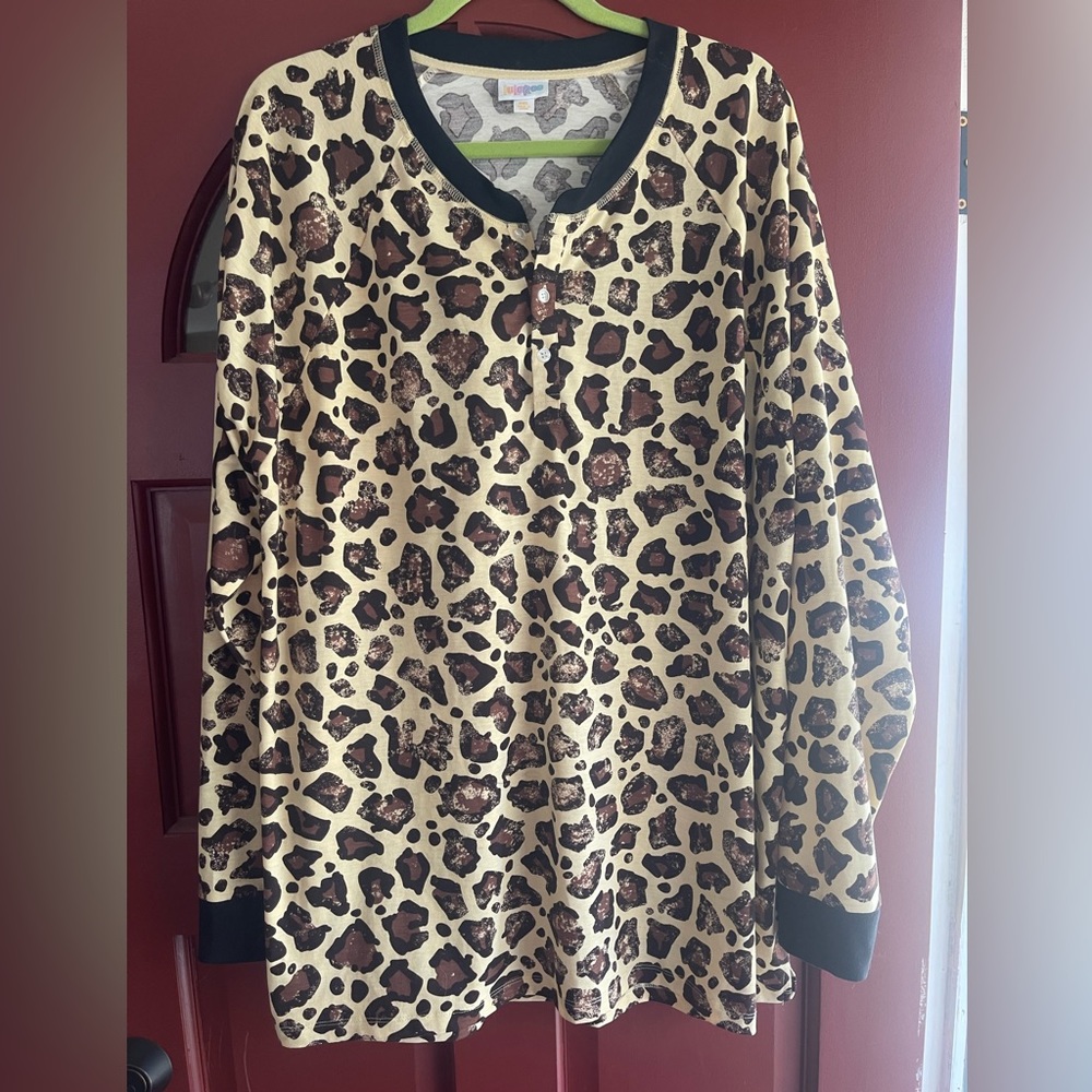 - NWOT LULAROE long sleeve animal print shirt. Size 3X